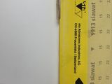a yellow box that has a black and white label on it