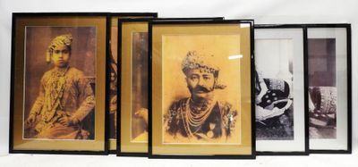 three framed photographs of a man and a woman in traditional clothing