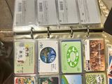 a suitcase that has a bunch of cards in it