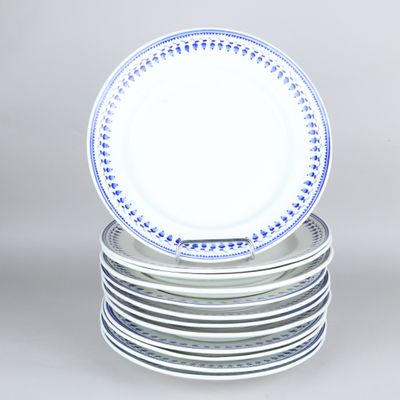 several plates stacked on top of each other on a table