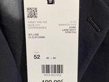 a close up of a black suit with a tag on it