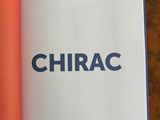 an open book with the words chiracc on it sitting on a table