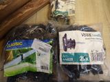 a bag of black raisins and a bag of raisins on a table