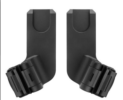 une paire de supports en plastique noir pour appareil photo sur fond blanc