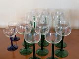 many wine glasses sitting on a table with a price tag on it