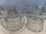 a lot of glass items sitting on a table