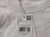 a white t - shirt with a barcode on it