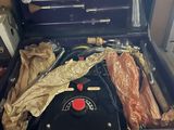 an open suitcase with a bunch of tools inside of it