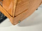 a close up of a piece of luggage on a table