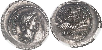 a close up of a silver coin with a man on it