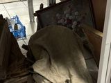 a pile of luggage sitting on the floor next to a door