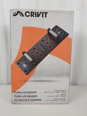 the box of the electronic device is open on a white surface