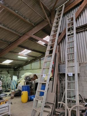 a ladder leaning up against a wall in a building