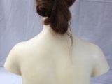 the back view of a mannequin head with a braid in it