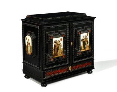 a black cabinet with two pictures on the doors