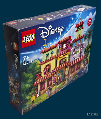 a box of lego disney castle sets on a blue background