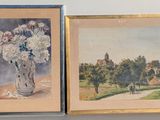 two paintings of flowers in a vase on a table next to a wall