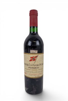 a bottle of wine that is sitting on a table