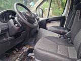 a van that has been vandalized with a steering wheel