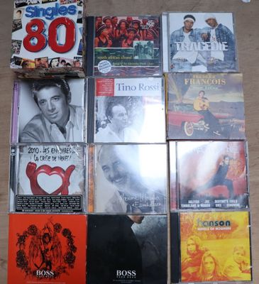 beaucoup de CD de musique par terre