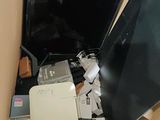 a box full of electronic equipment sitting on the floor