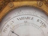 a clock that is on the side of a building
