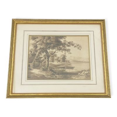 painting of a farm scene in a gold frame on a white wall