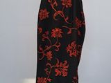 black and red floral dress on a mannequin mannequin mannequin mannequin mannequin mannequin mannequin mannequin mann