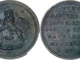 a close up of a coin with a lion on it