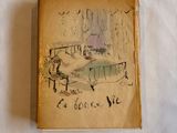 un vieux livre sur lequel figure le dessin d'une femme assise sur un lit