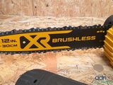 a close up of a chainsaw sitting on top of a piece of wood