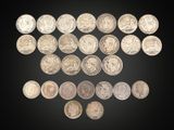 an image of a group of silver coins on a black background