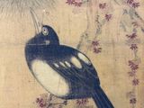 a painting of a bird sitting on a branch of a tree