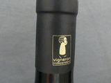 a bottle of wine that is sitting on a table