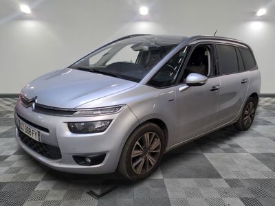 the silver citrole is parked on a checkered floor