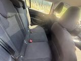 the back seats of a car are empty in the sun