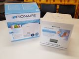 a box of bioaire on a table next to a box of water