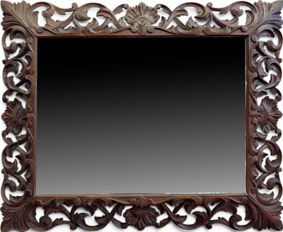 Miroir à cadre bois sculpté et ajouré de rinceaux et coquill…