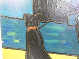 un tableau représentant un chien noir avec un collier rouge