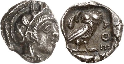 a silver coin with an image of a woman and a bird on it