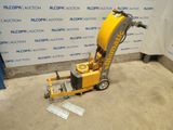 an image of a machine that is sitting on the ground