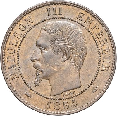 Gros plan sur une pièce de monnaie portant le visage d'un homme