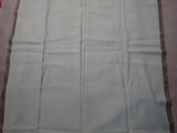 an image of a white table cloth on a table