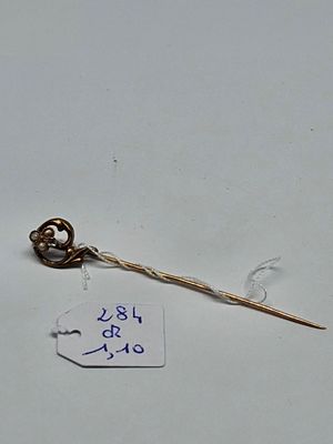 an image of a stick with a key on it