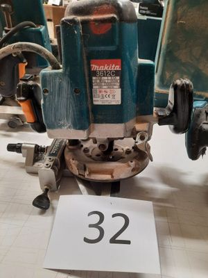 a machine that is sitting on a table with a number 32 on it