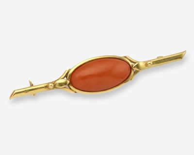 une image représentant une broche en or et en cornaline