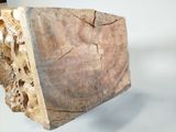 a piece of wood that has been carved into a piece of wood