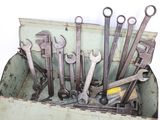 many wrenches in a box with tools in it