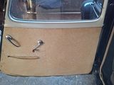 a picture of a car door with a handle on it