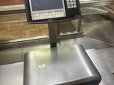 une photo d'une caisse enregistreuse dans un magasin